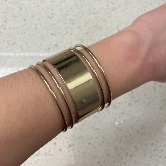 Stylish Shiny Aldo Gold Slip On Bangle Bracelet With Cut Outs - Picture 3 of 7